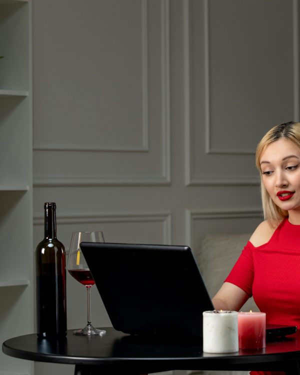 virtual-love-blonde-girl-red-dress-distance-date-with-wine-talking-camera
